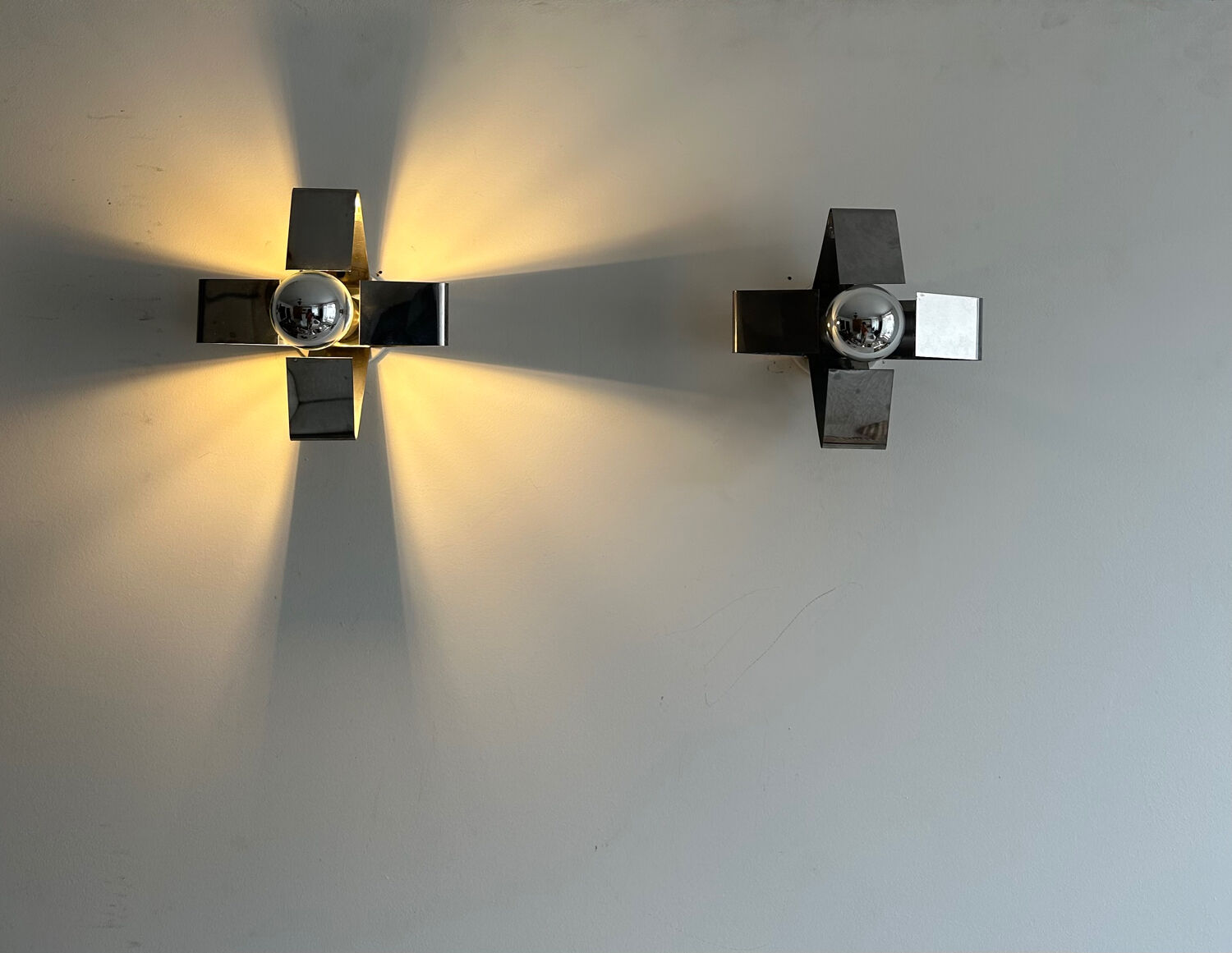 Pair of wall lamps in chromed metal France 1970