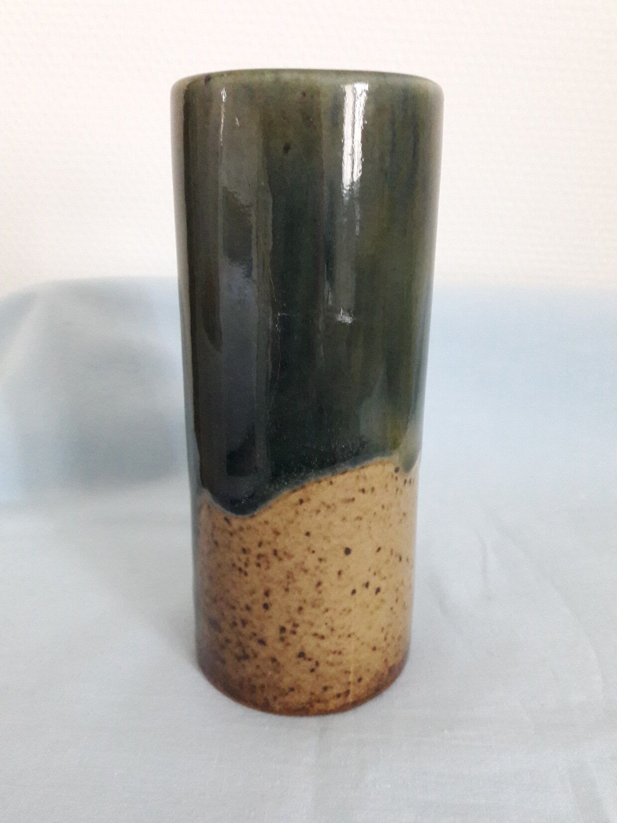 Signed sandstone roll vase