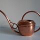 Vintage copper watering can