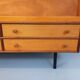 Vintage wooden display bookshelf with drawers from the 1960s.