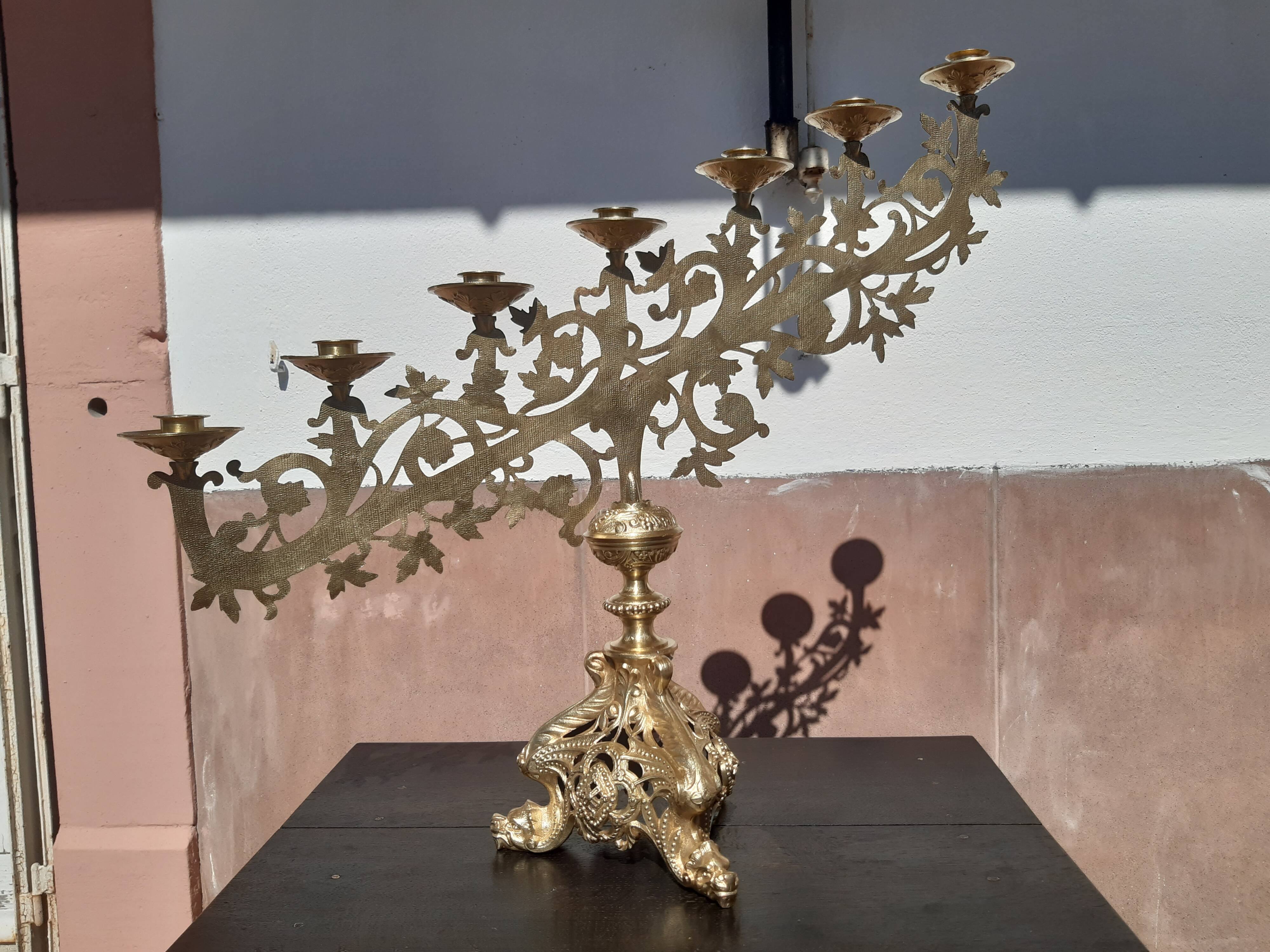 Antique candle holder in bronze and brass nineteenth century.