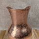 Antique hammered copper jug