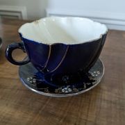 Set of two large Lunéville cups and saucers
