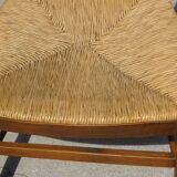 Grandfather's armchair in wood and straw.