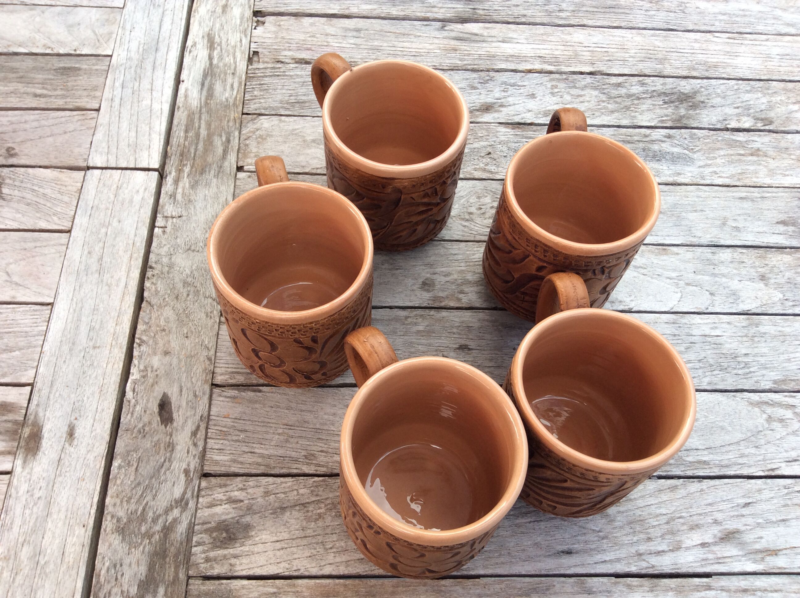 5 terracotta mugs