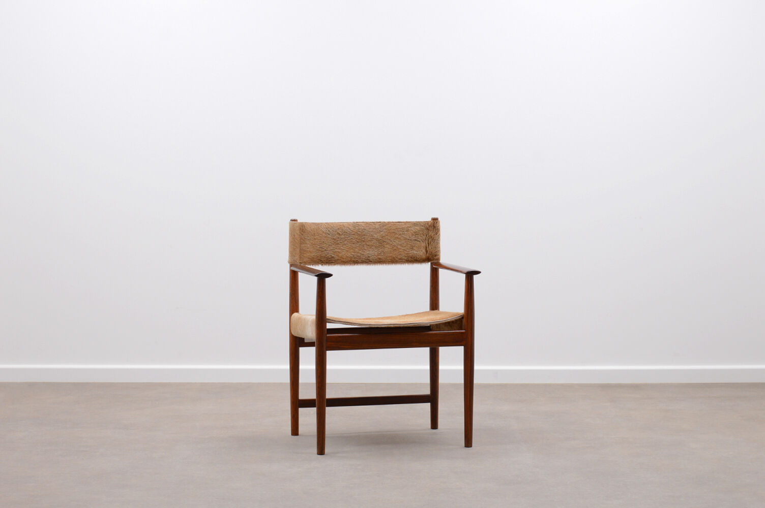 Rosewood and cow hide chair by Kurt Østervig for Sibast, 60s Denmark.