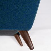 Armchair upholstered with dark blue wool fabric and legs in dark wood, of danish design, 1960s