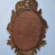 Large oval gold mirror, Louis XV rococo style, late 19th century, 114 x 66 cm.