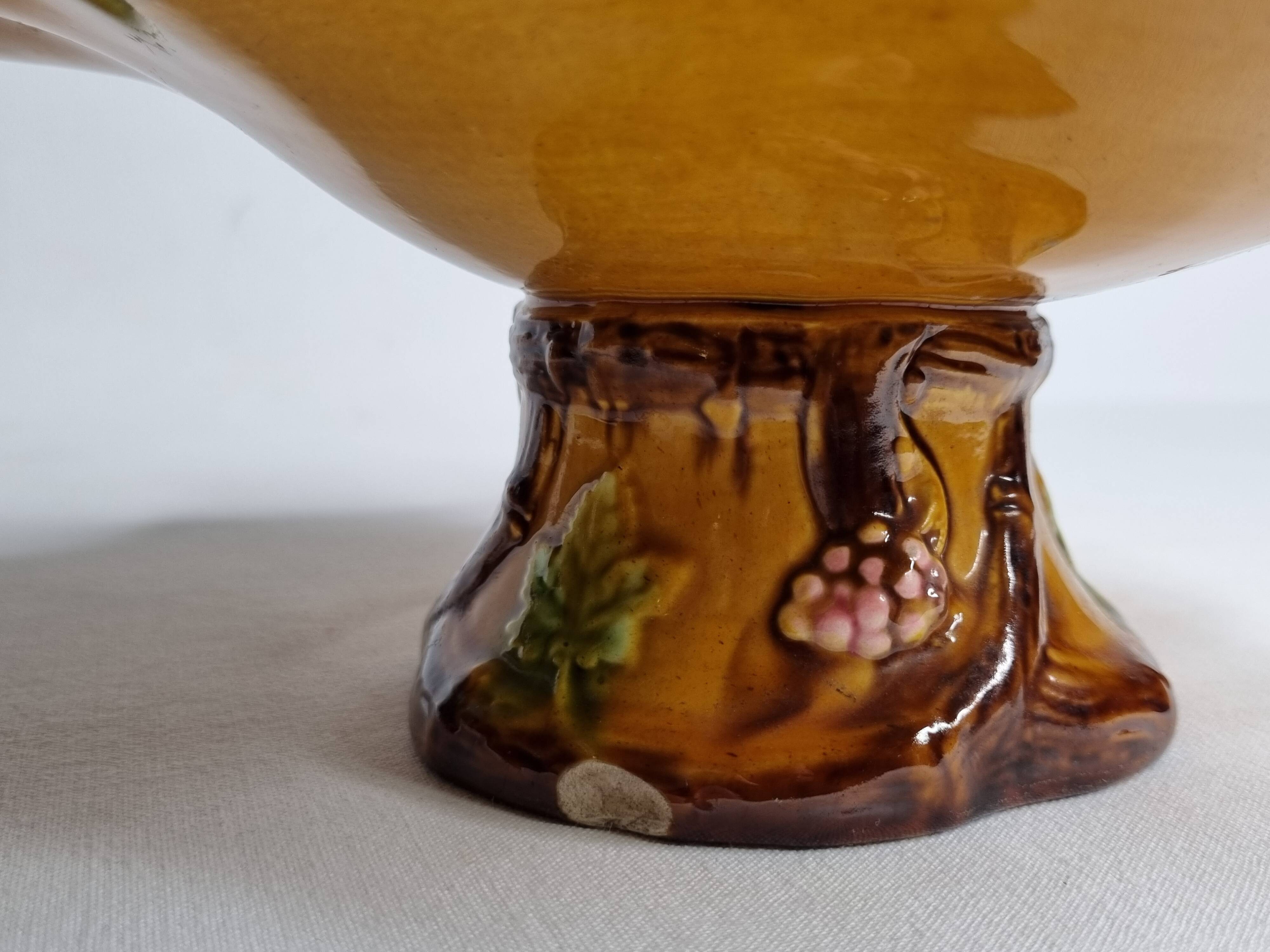 Old Villeroy and Boch compotier, decorated with green and ocher vine leaves, 1900