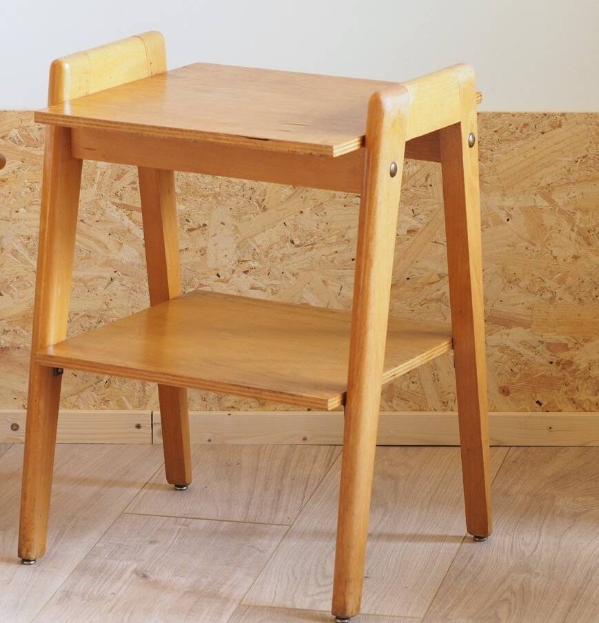 Bedside or side table with compass legs.