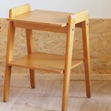 Bedside or side table with compass legs.
