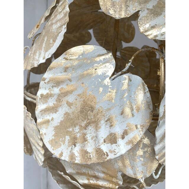 Contemporary gold-leaf and white leaves sphere suspension pendant
