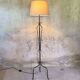 Vintage tripod floor lamp in wrought iron.