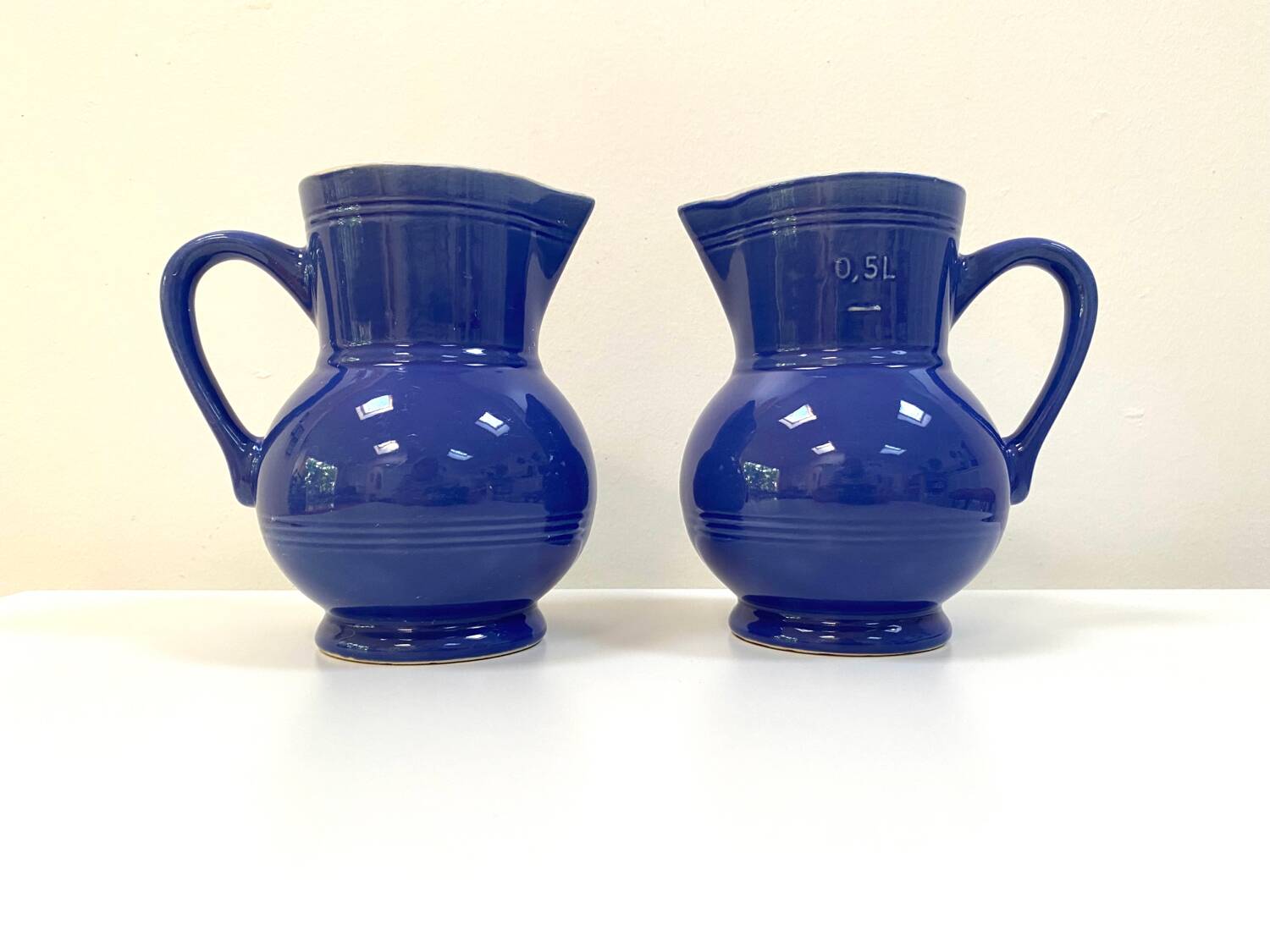 Duo of Emile Henry bistro pitchers