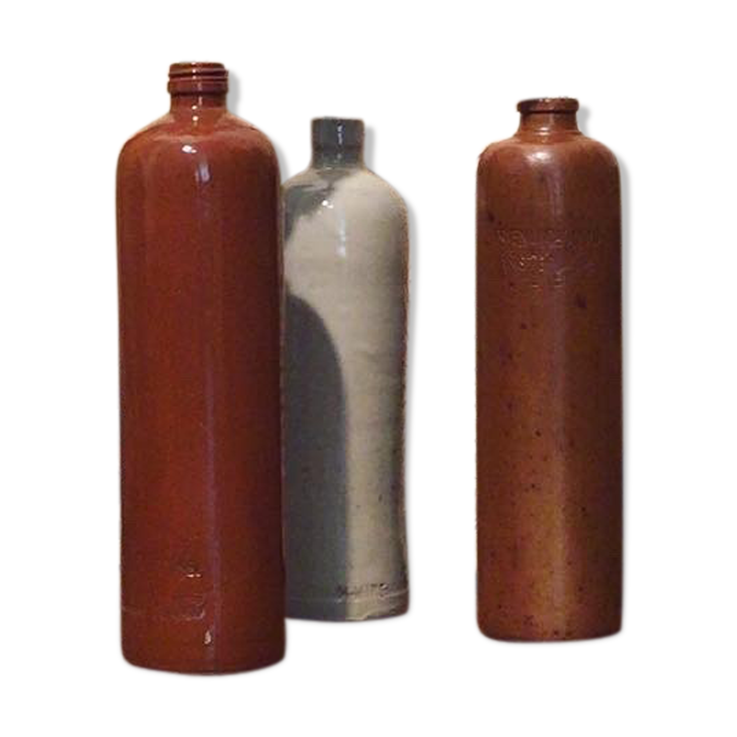 Lot of three bottles in 1900 sandstone