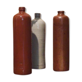 Lot de trois bouteilles en grès 1900