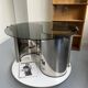 Vintage metal and smoked glass coffee table on casters bar