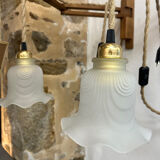 Two portable lamps with wall mount.