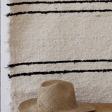 White carpets black Berber lines