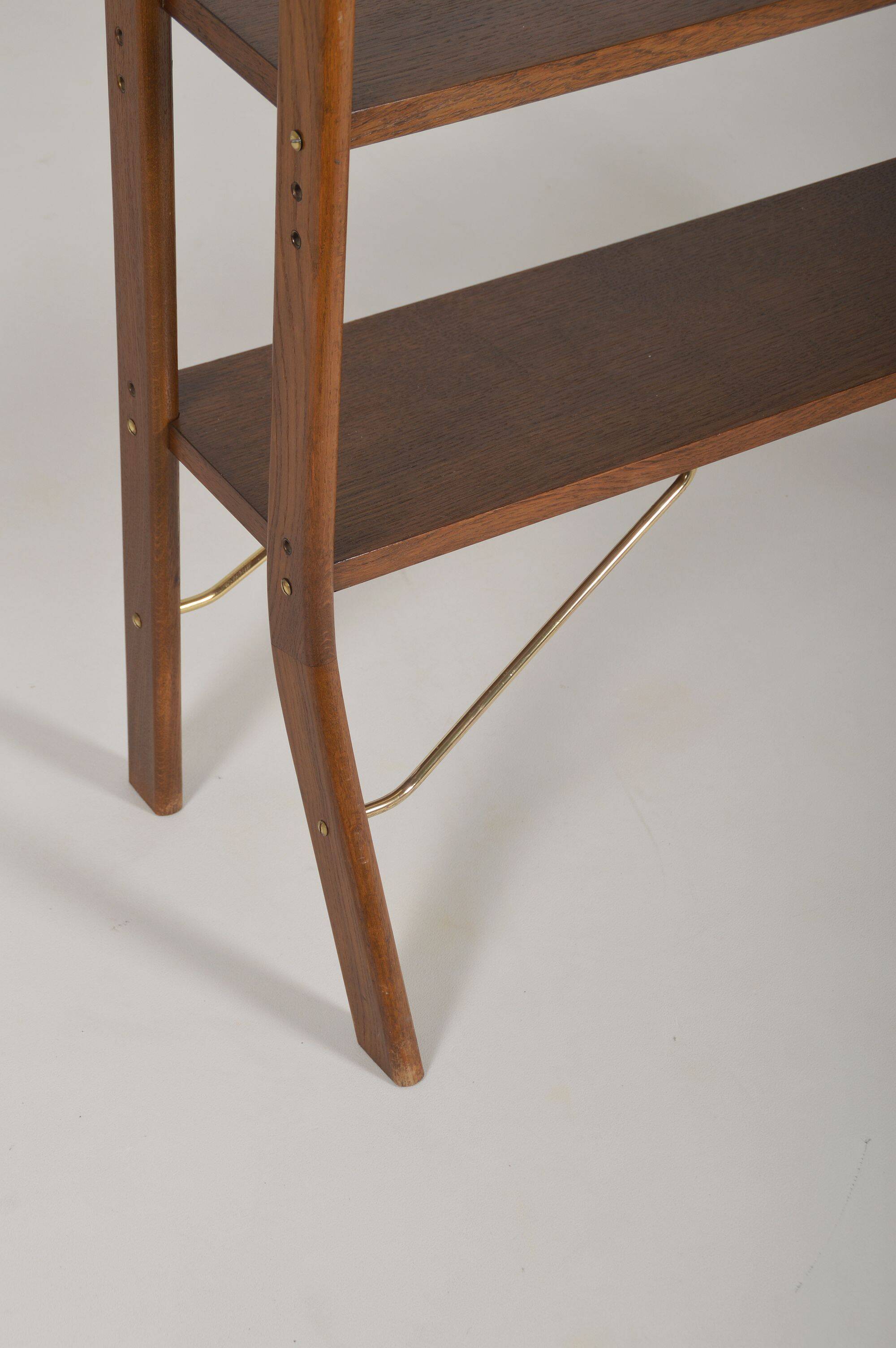 Danish freestanding wall rack with brass accents, 1960s