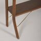 Danish freestanding wall rack with brass accents, 1960s