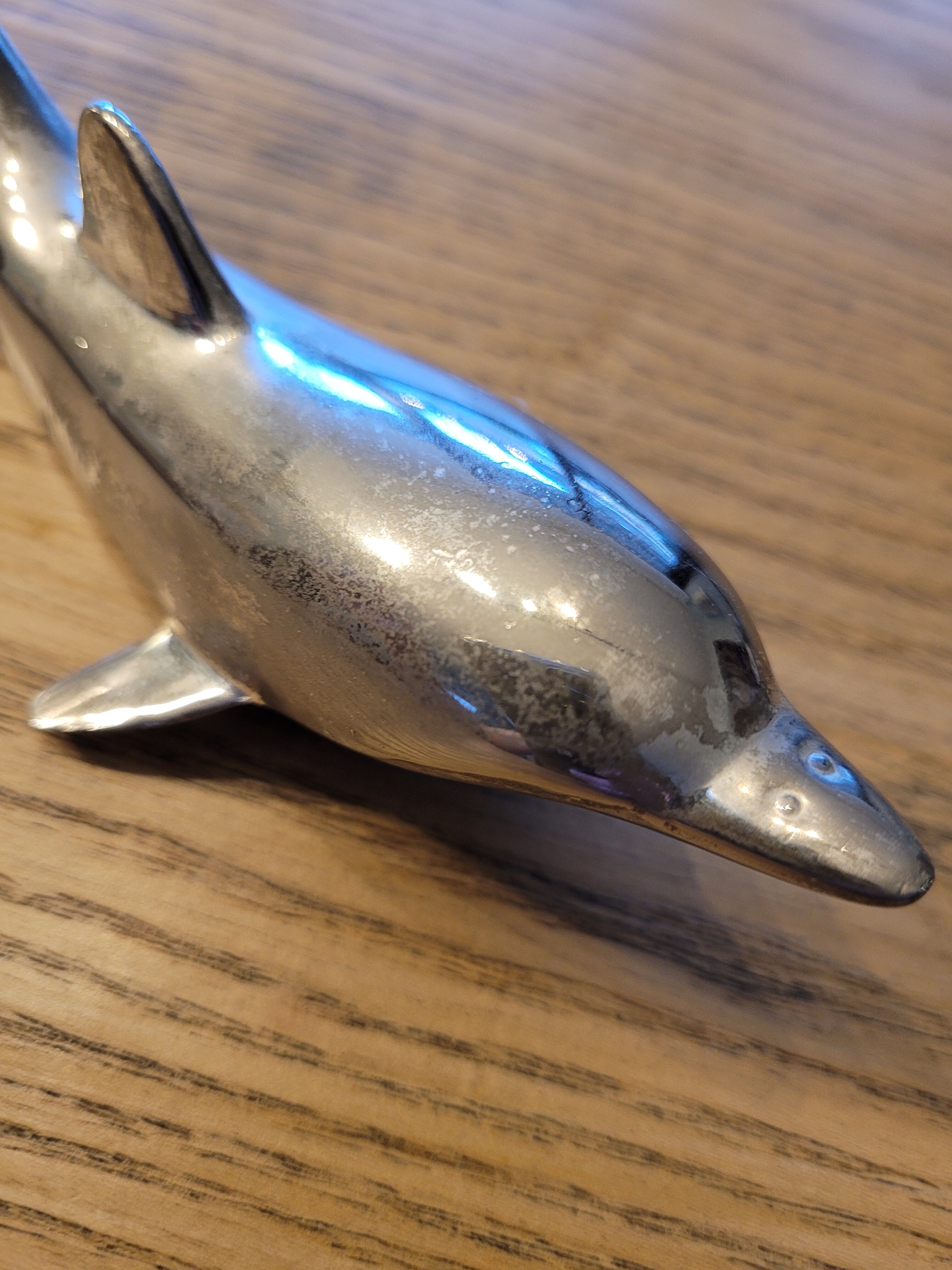 Silver dolphin bottle opener
