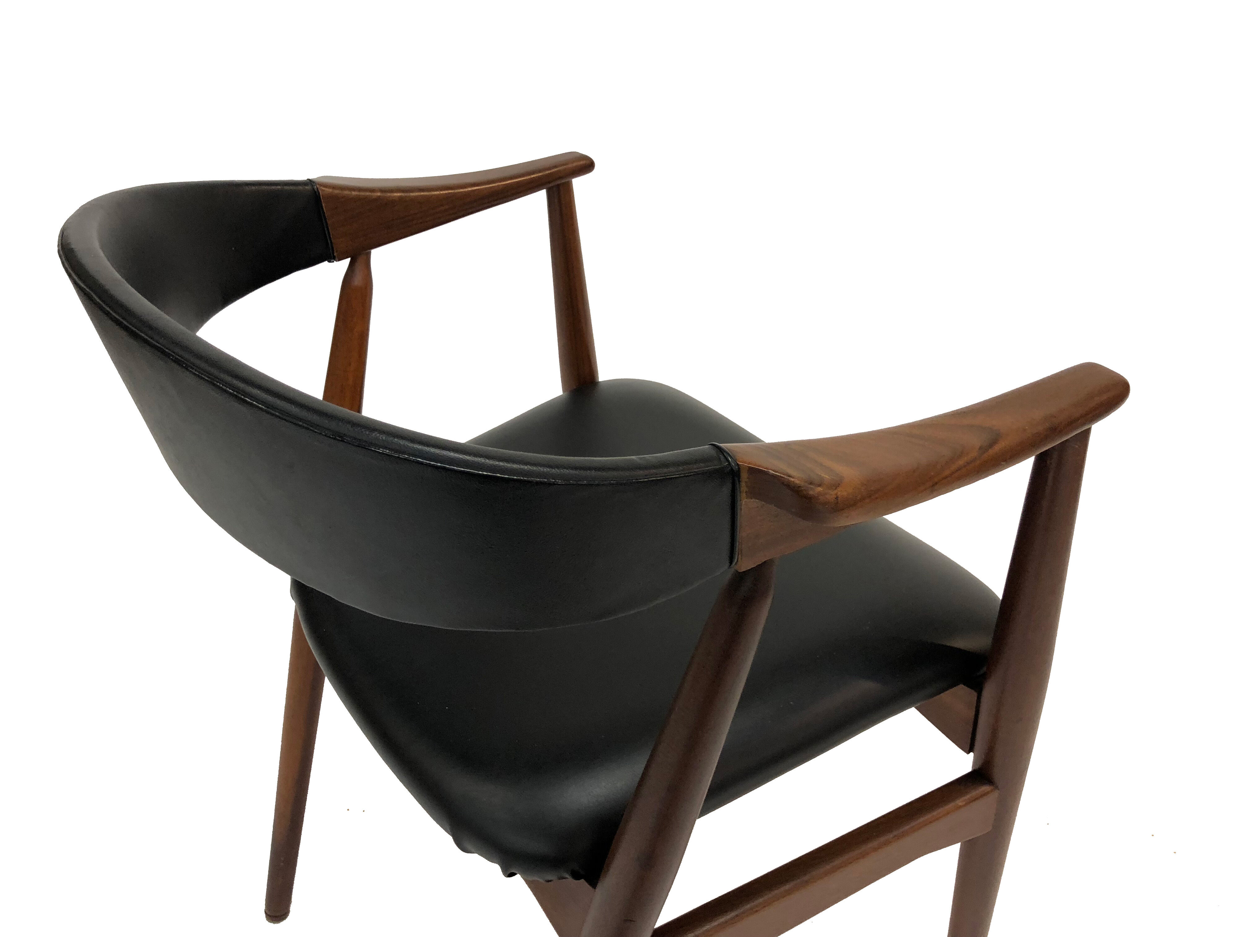 Vintage armchair from the 60s in teak