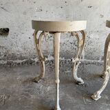 Pair of cream-white cast iron side tables with wooden tops — neoclassical shabby-chic