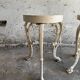 Pair of cream-white cast iron side tables with wooden tops — neoclassical shabby-chic