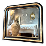 Antique gilded Louis-Philippe mirror, 19th century.