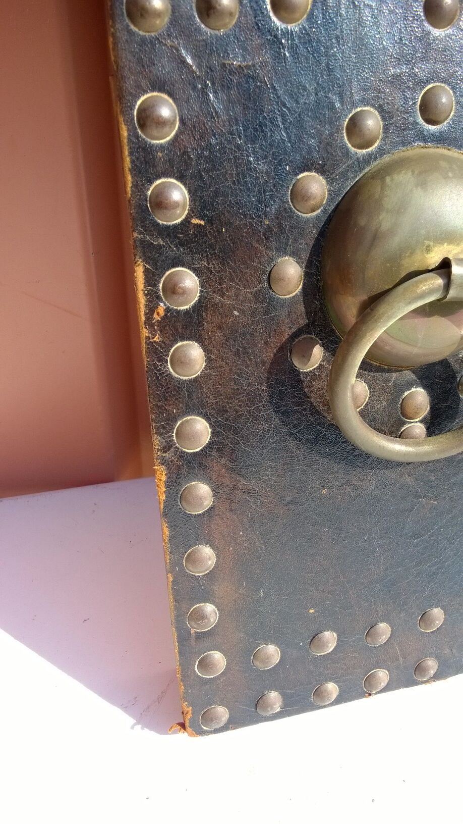 Oriental mirror leather and nails 28x55cm