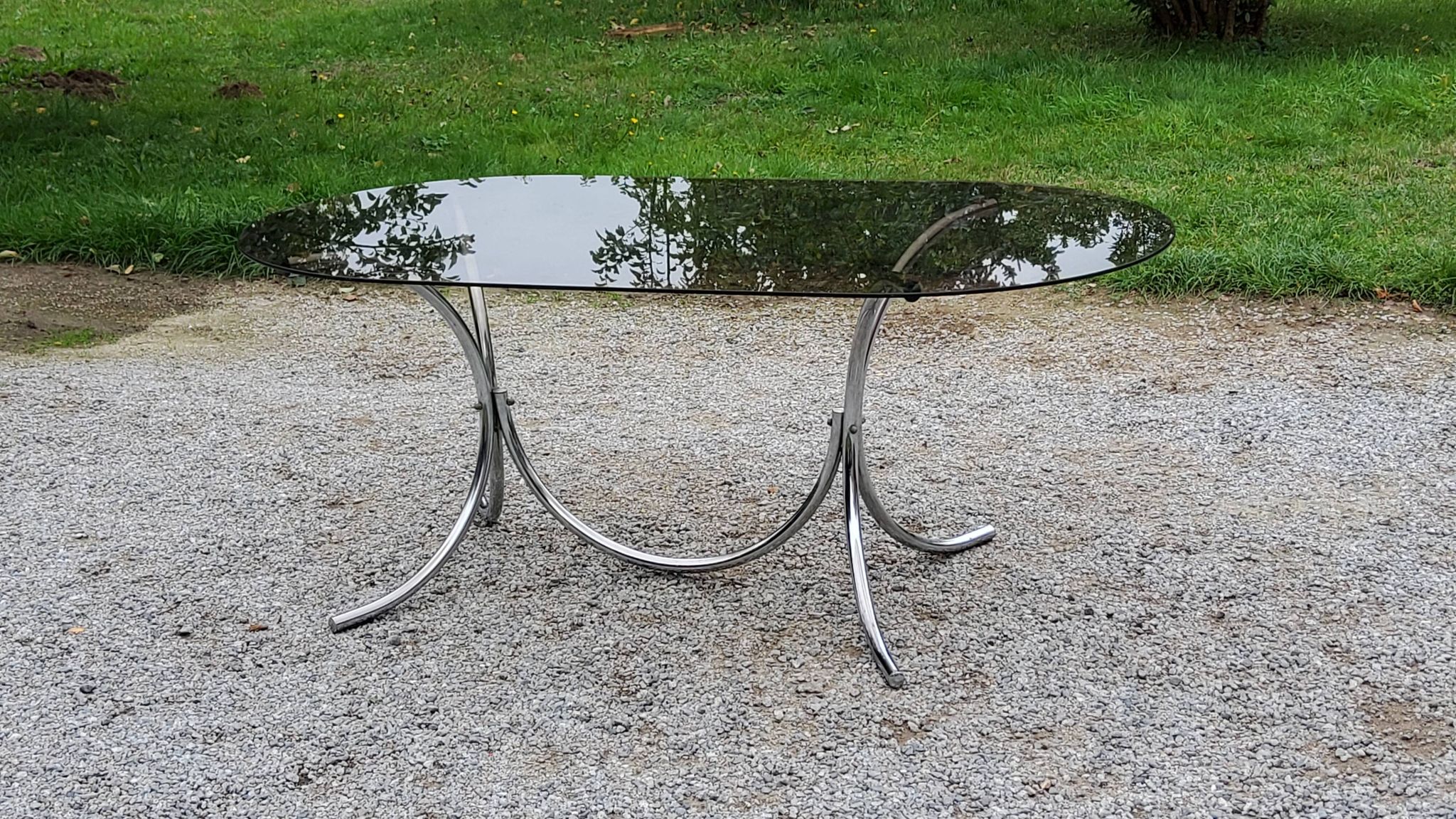 Dining table from the 70s top smoked glass base chrome