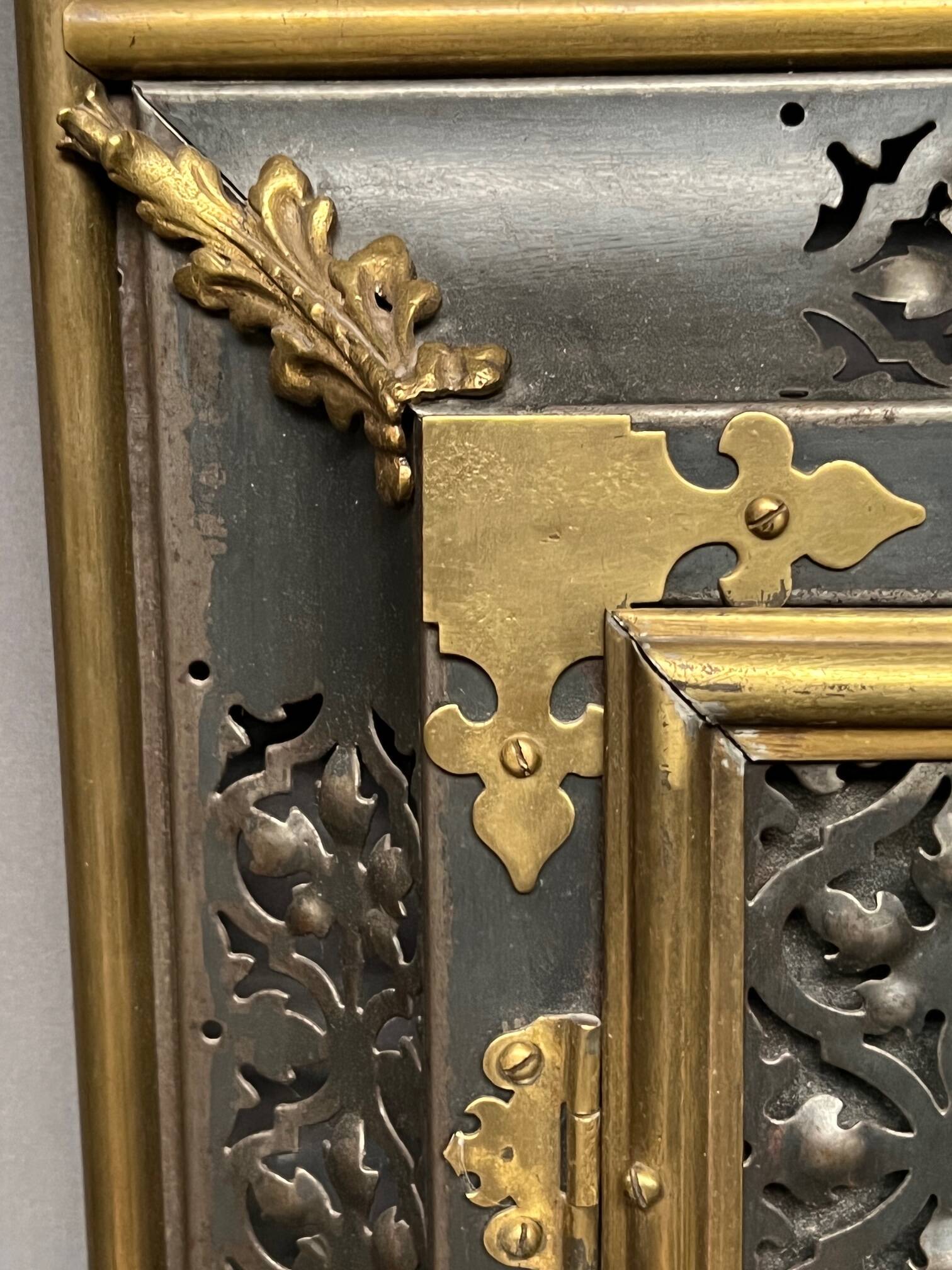 Fireplace screen. Bronze, copper, metal, gilding.