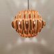Copper colored hanging lamp. designed by thorsten orrling sweden