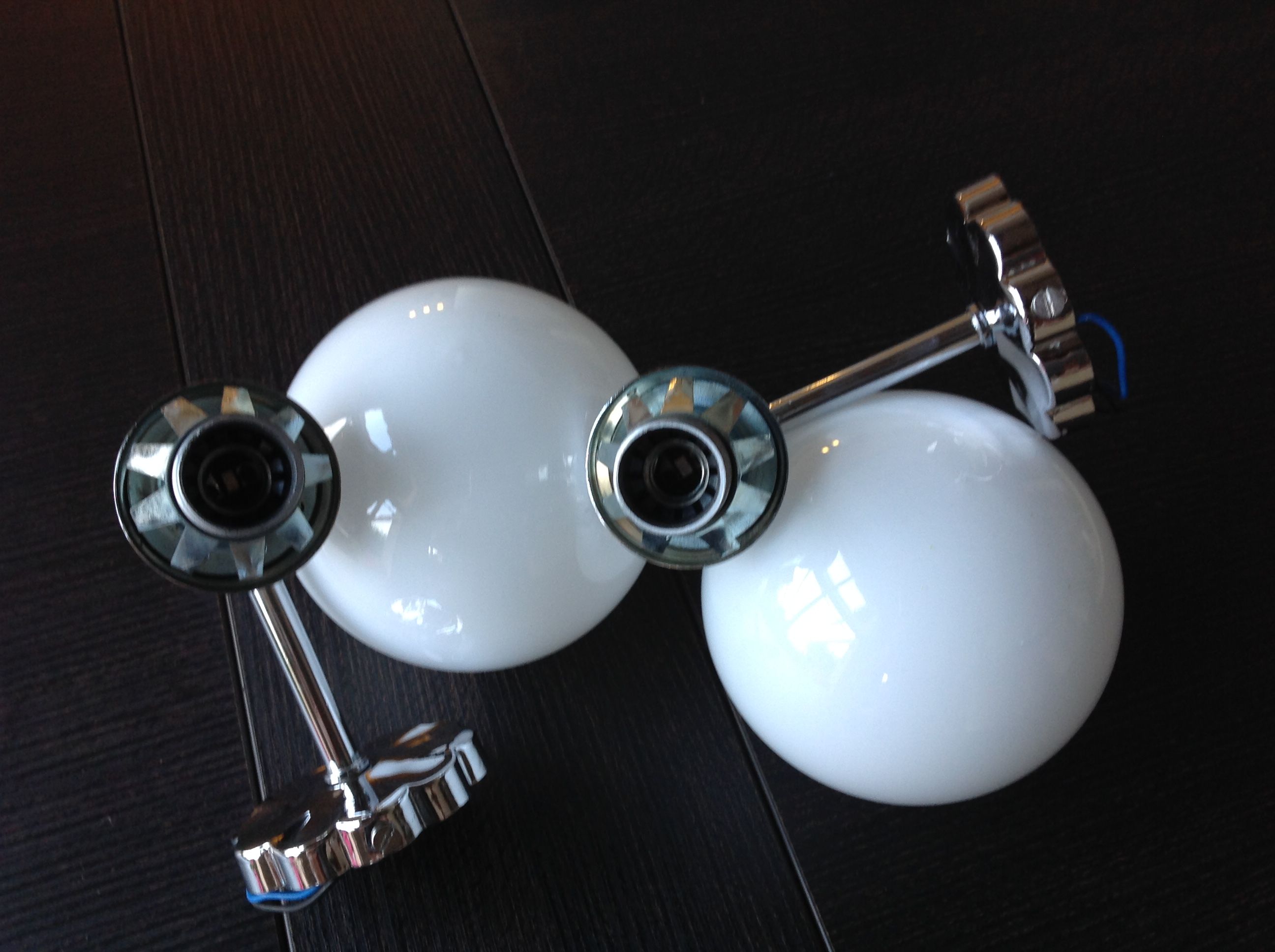 Pair of globe wall lamps in white opaline and chrome/vintage metal 70s