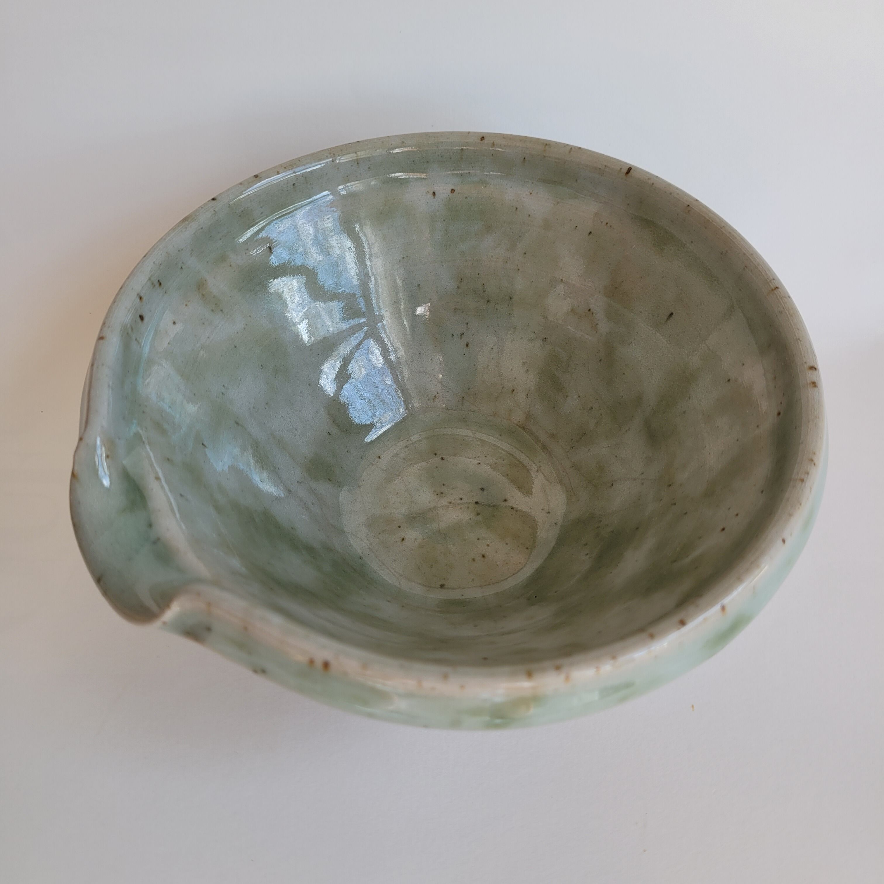 Bowl spout in sandstone