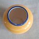 Vintage ceramic vase in a round shape.