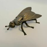 Old brass ashtray in the shape of a fly