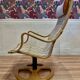 Swivel armchair and its ottoman in 1960s Scandinavian design.