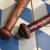 2 old wooden juggling clubs