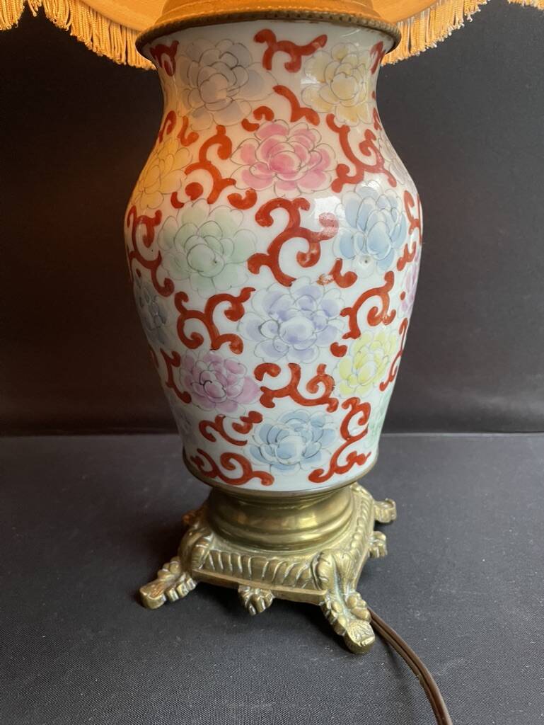 Old Asian vase mounted as a lamp with pagoda lampshade