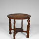 Asian coffee table carved with dragons and peacocks, Indonesia, early 20th century