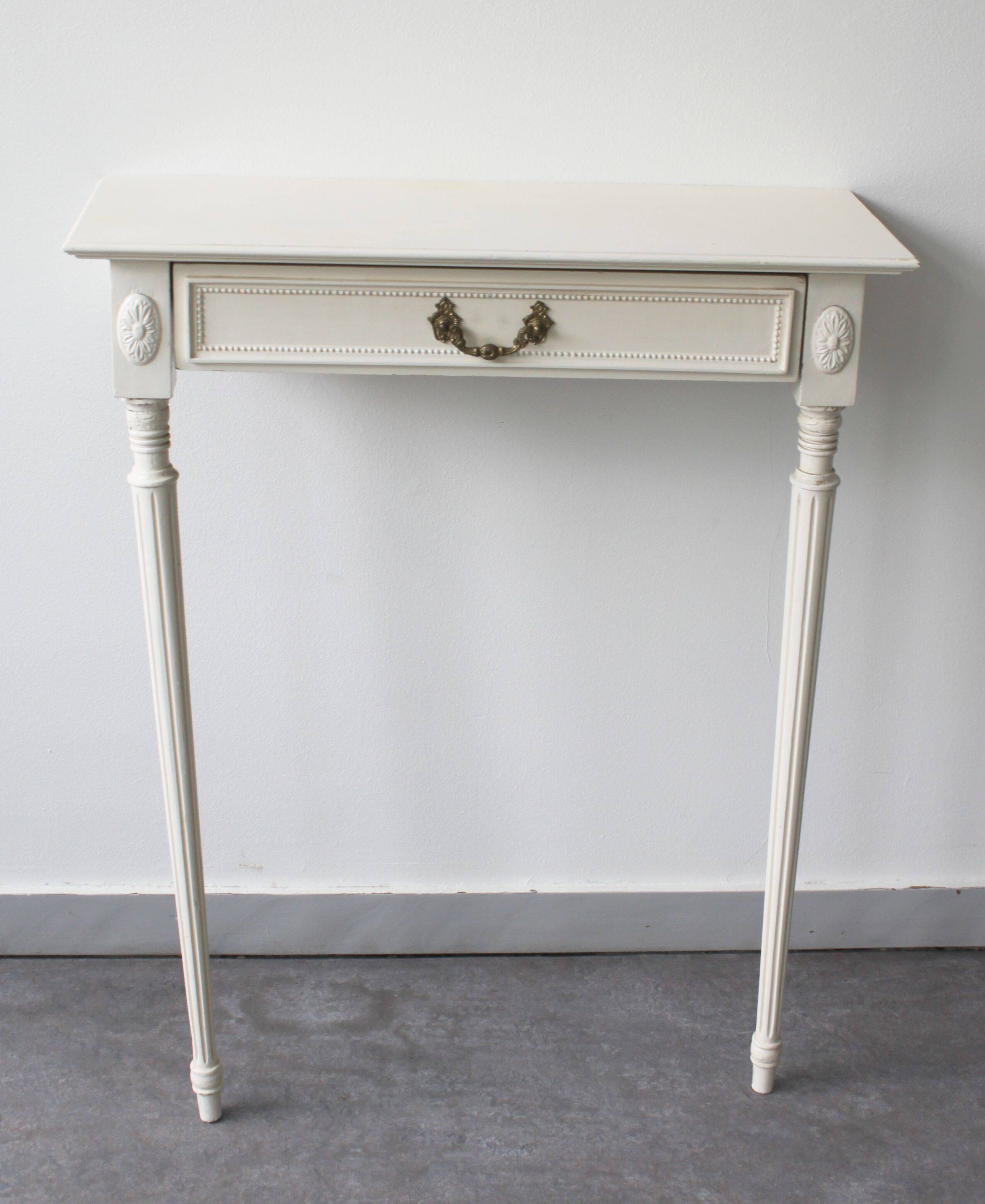 Two-legged wall console in Louis XVI style, painted wood.