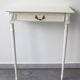 Two-legged wall console in Louis XVI style, painted wood.
