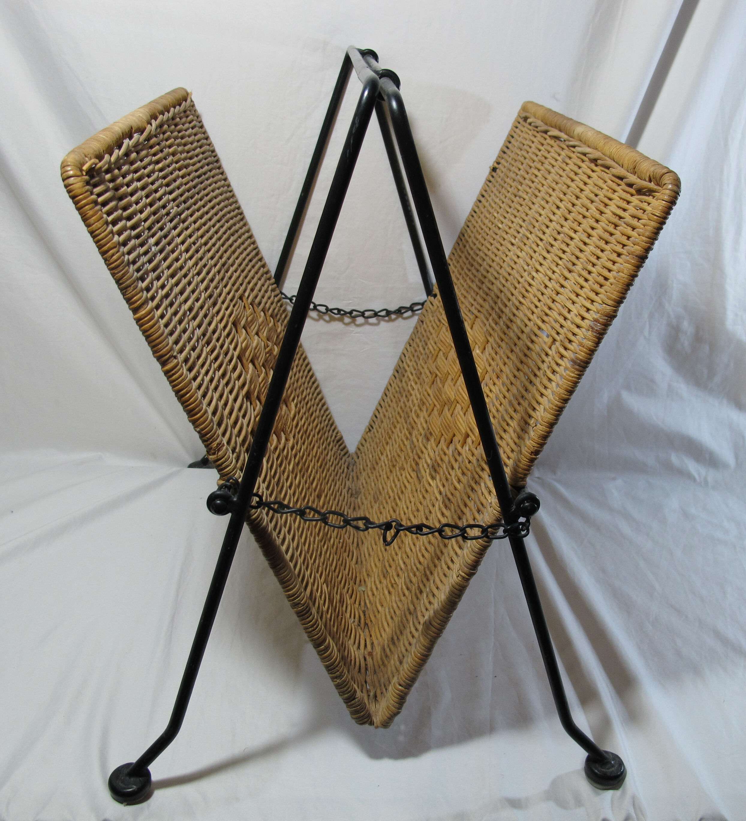 Vintage magazine rack in metal and wicker