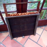 White veined black marble fireplace