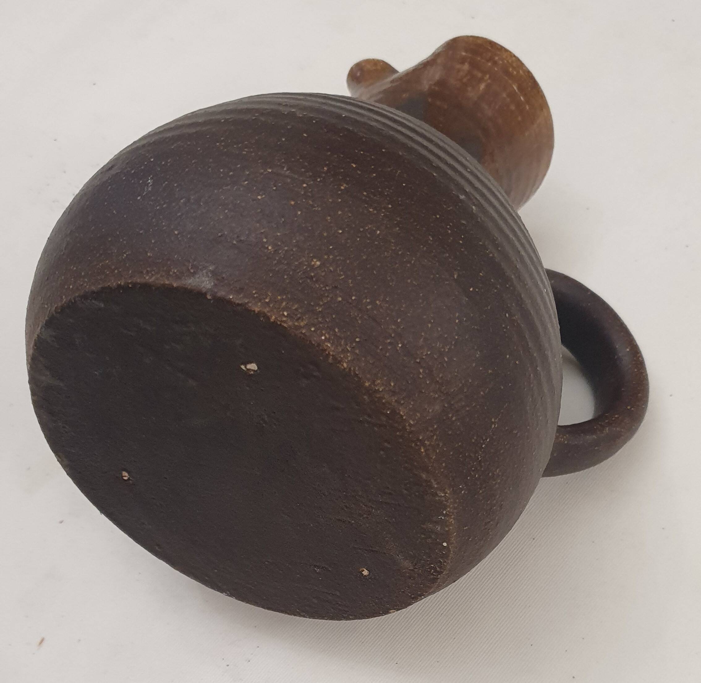 Artisanal jug with flamed interior