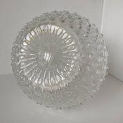 Beautiful and large vintage glass jug with a handle, made of clear hot-worked glass.