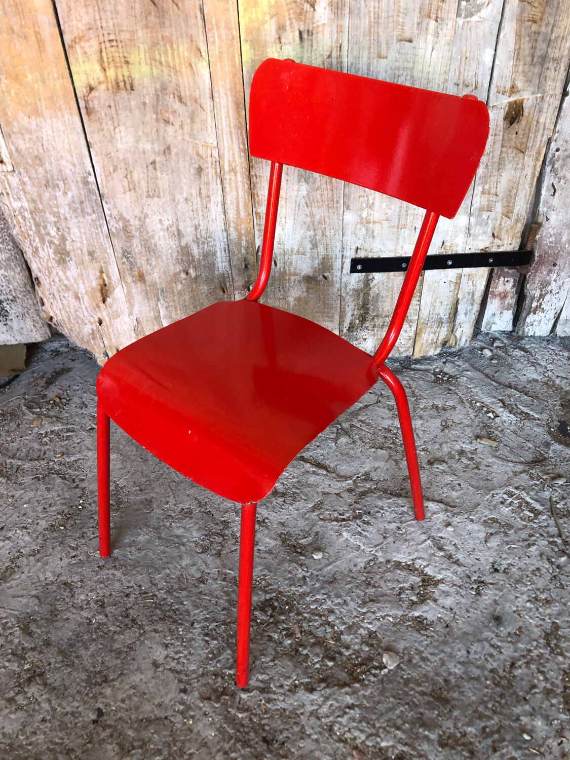 Set of 4 red metal chairs