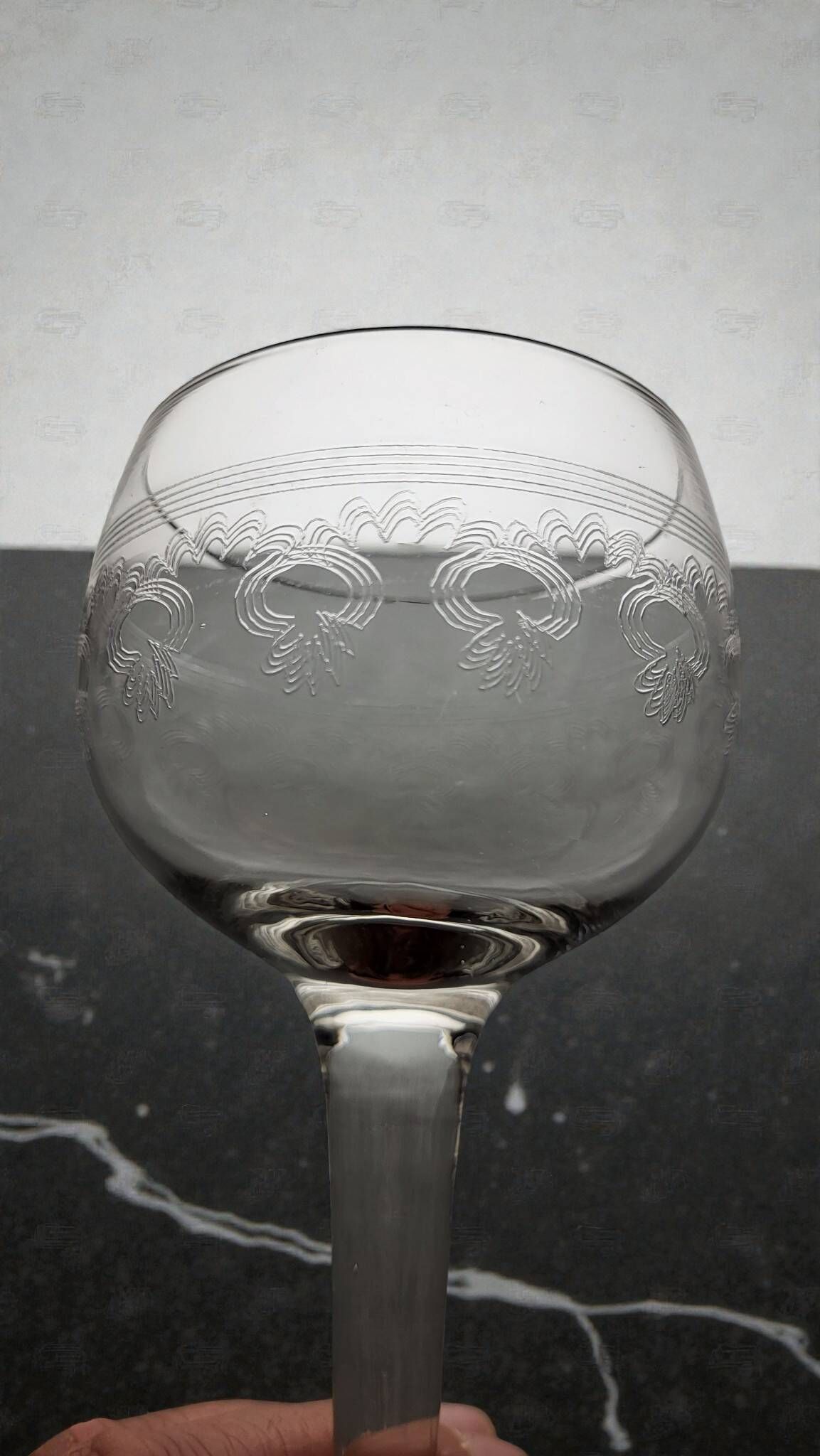 9 guilloché wine glasses, early 20th century.